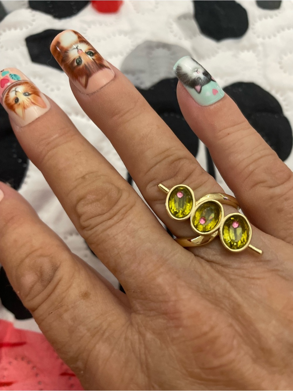 Source Unknown Gold Ring with Yellow-Green Gemstones